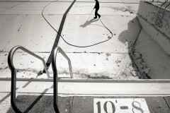 hc 0427 ftf pool2 ct m6.35 x 4.5Tom Rouleau of Milwaukee County Parks Maintenance used compressed air to clean out crack in the deep end of the Hales Corners Park pool April 19 to be repaired before the entire pool is painted and filled in time for the Memorial Day opening.