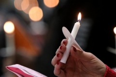 Candlelight concluded a program of speakers with words of hope and song during a "Day of Light" program at West Allis Central High School on Feb. 25. The program was prompted by the loss of West Allis brothers CJ and Tra Edwards who were shot and killed in an attempted robbery on Feb. 12.