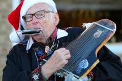 Street singer Clete Kramer performs for whoever passes by during the sixth annual Oconomowoc German Christmas Market at the Village Green on Nov. 25.