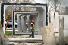 eg 0420 legion2 raw ct m
7.8 x 4.5
A Rawson Construction employee observes the lift of a box culvert section into a trench dug under Legion Drive April 13 as part of the stormwater retention project. Installation of the box culvert and rerouting sewer laters has severely restricted access to businesses along Legion Drive.