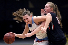 Arrowhead's Caitlyn Harper drives past Waukesha South's Anne Johnson to the basket during WIAA Division 1 sectional play at Brown Deer on March 1.