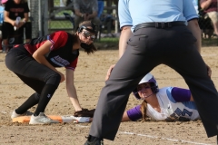 Arrowhead's Megan Morrow and Waukesha North's Hailey Marking look for the umpired call of safe at first during WIAA sectional final play at West Allis Hale on May 31 with North winning 1-0.