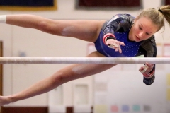 Brookfield'sCaitlyn Albrecht competes in uneven bars during a dual meet at Menomonee Falls on Jan. 4.