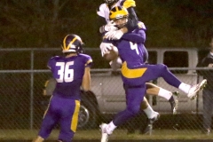 New Berlin Eisenhower's Brett Angiolo breaks up a pass intended for Whitnall's Dan Alexopoulos at Eisenhower on Oct. 12.