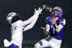 Waukesha West's Reed Larson nearly intercepts a Catholic Memorial pass to Luke Fox at in the second quarter at Waukesha West on Oct. 13.